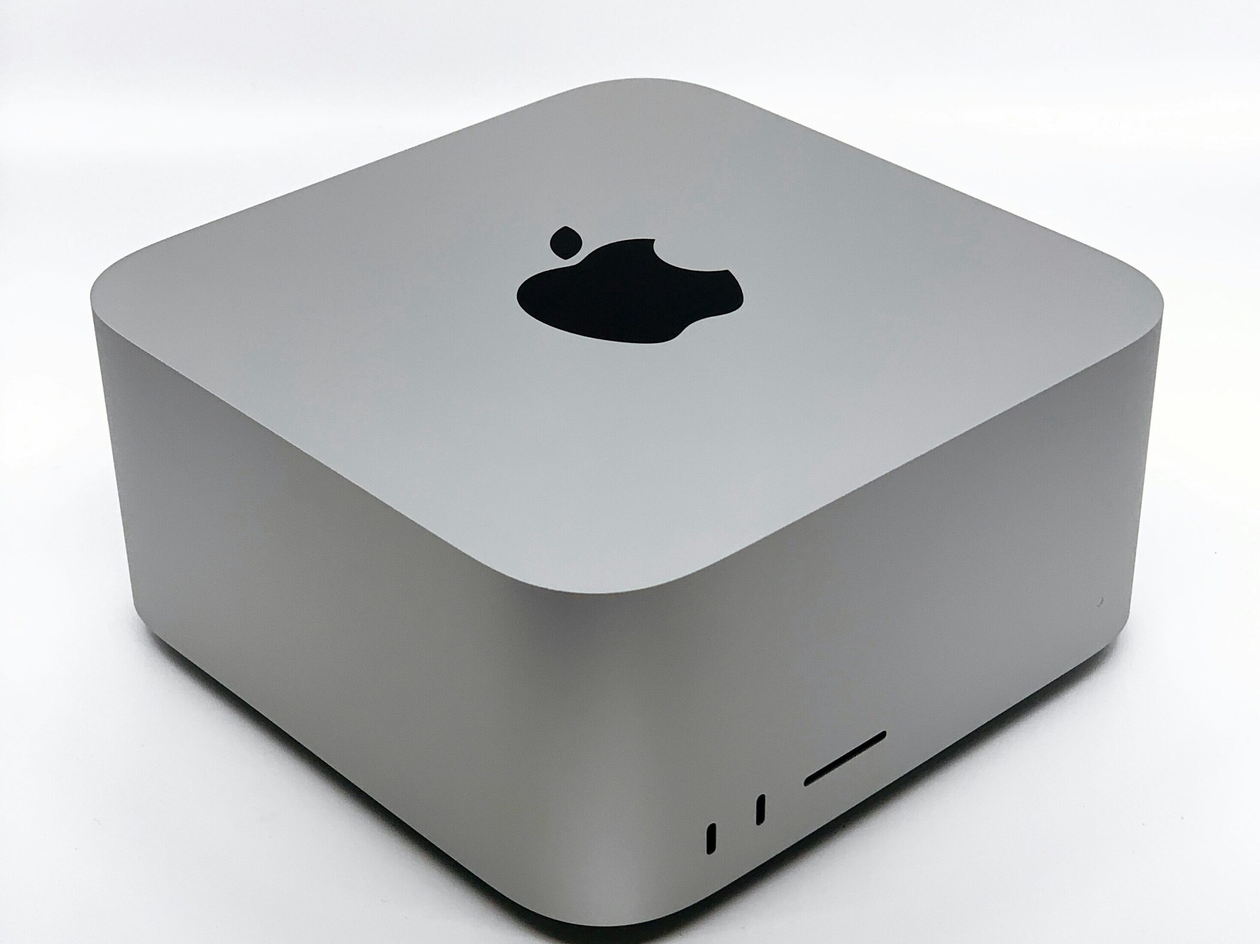 Mac-mini computer. VerseOne.ai builds local AI systems for your business, so no private information ever leaves your computer.