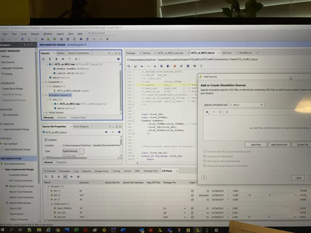 AMD Vitis IDE showing implemented FPGA design with HDL sources, simulation setup, and timing reports.