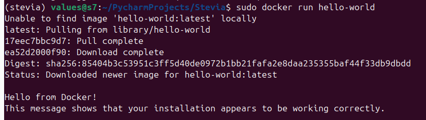 Terminal output showing successful Docker "hello-world" image pull and run with confirmation message.